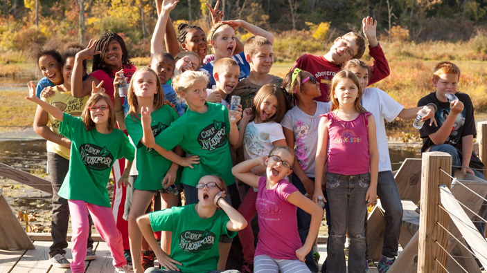 Group happy kids at camp mariposa