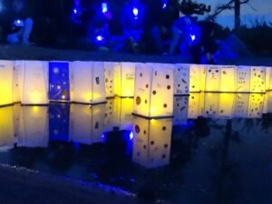 lighted bags displayed as a memorial