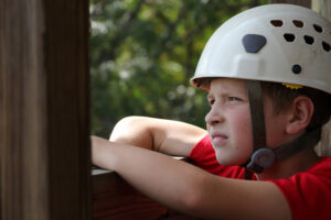 an Eluna Camp Erin camper preparing to participate in an activity.