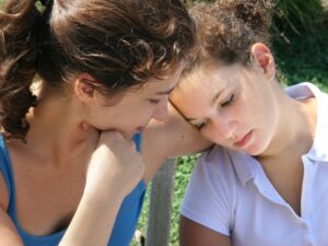 A mother and daughter having a conversation