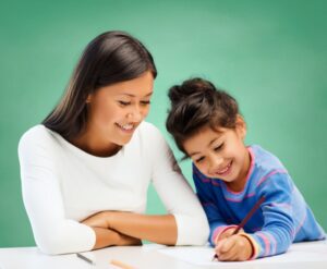 A parent and child work on an activity together