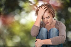 a teen displaying signs of depression