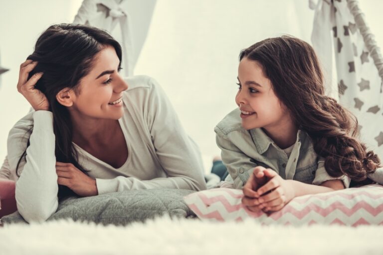 a mom and teen daughter talking