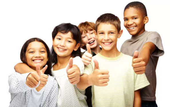 a group of kids giving the thumbs up