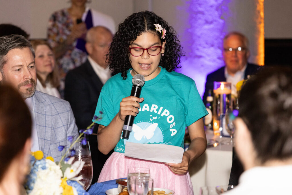 camp mariposa camper speaks at eluna's champion for children 2025 fundraiser