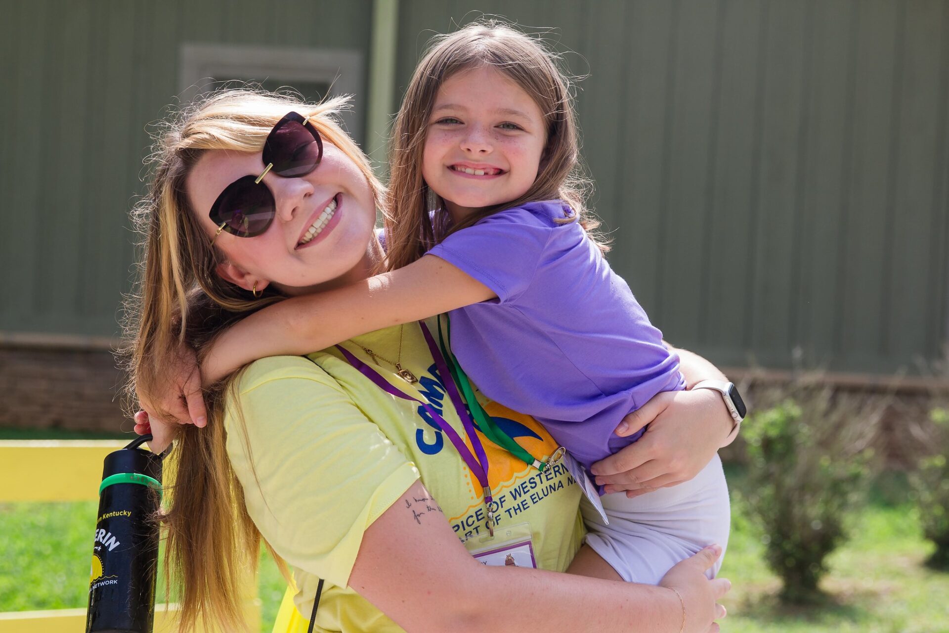 volunteer with camper camp erin
